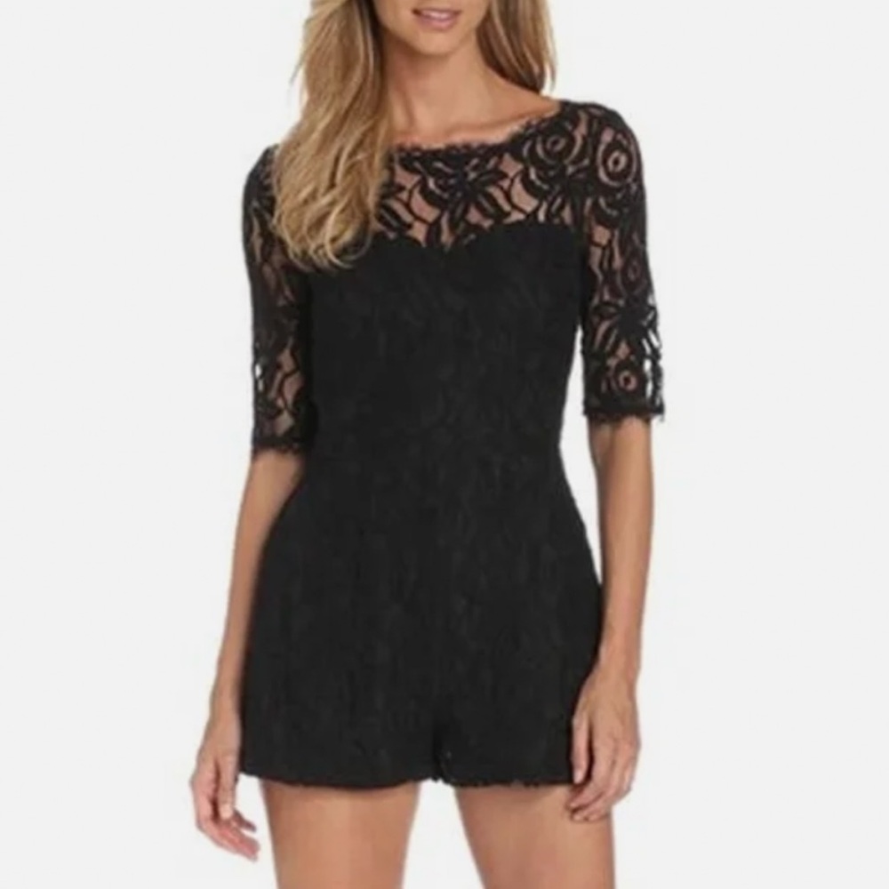 Brand New with the tags still attached BCBG Black Lace Romper